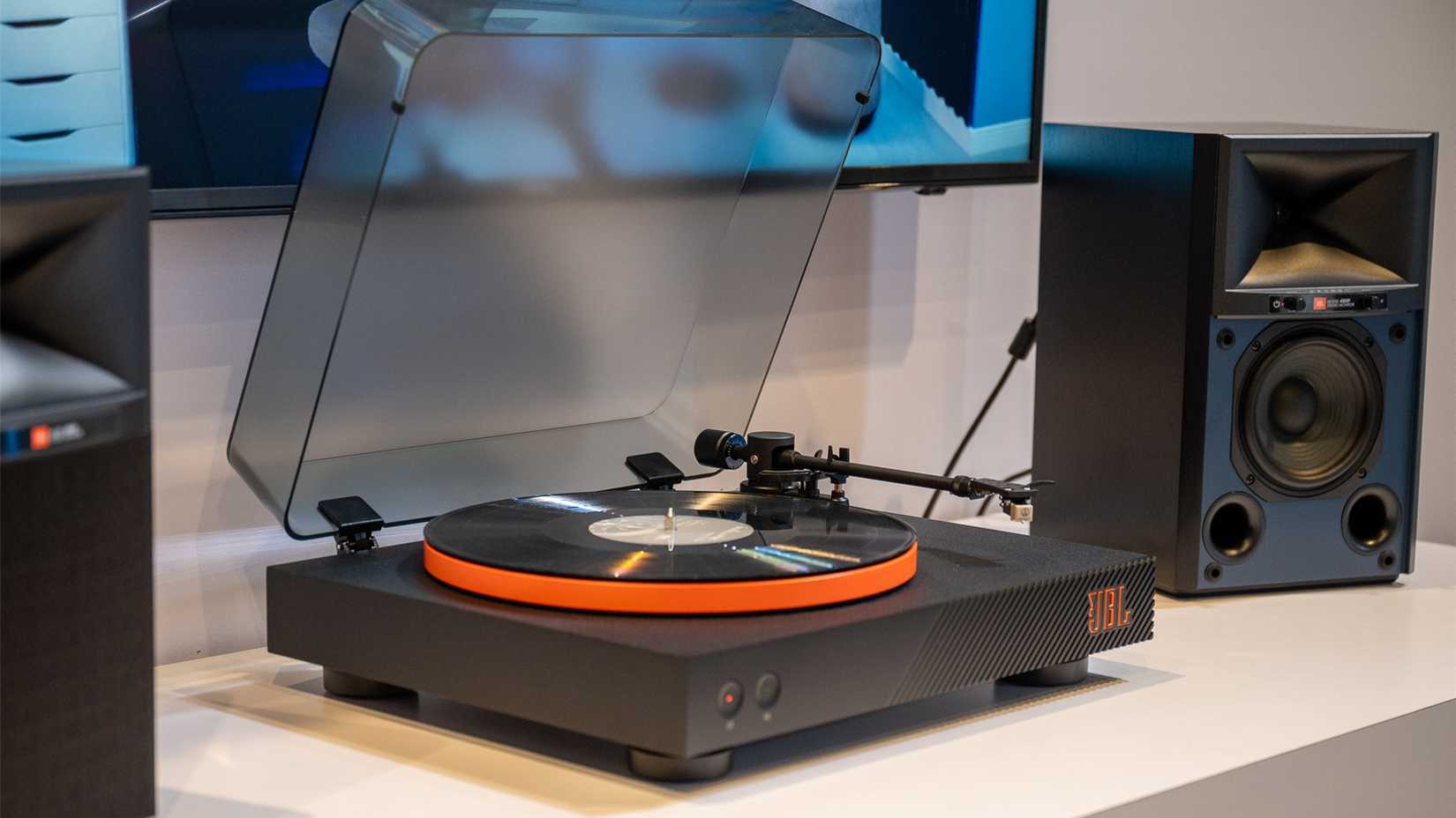 A vinyl-disk with loudspeakers.