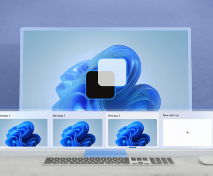 Экран с Windows 11 с предпросмотром нескольких виртуальных рабочих столов.