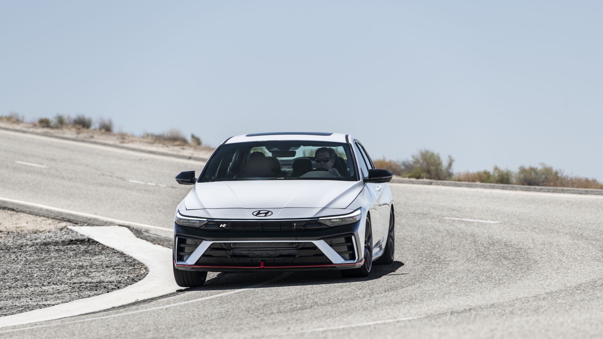 Head-on action shot of a 2025 Hyundai Elantra N