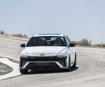 Head-on action shot of a 2025 Hyundai Elantra N