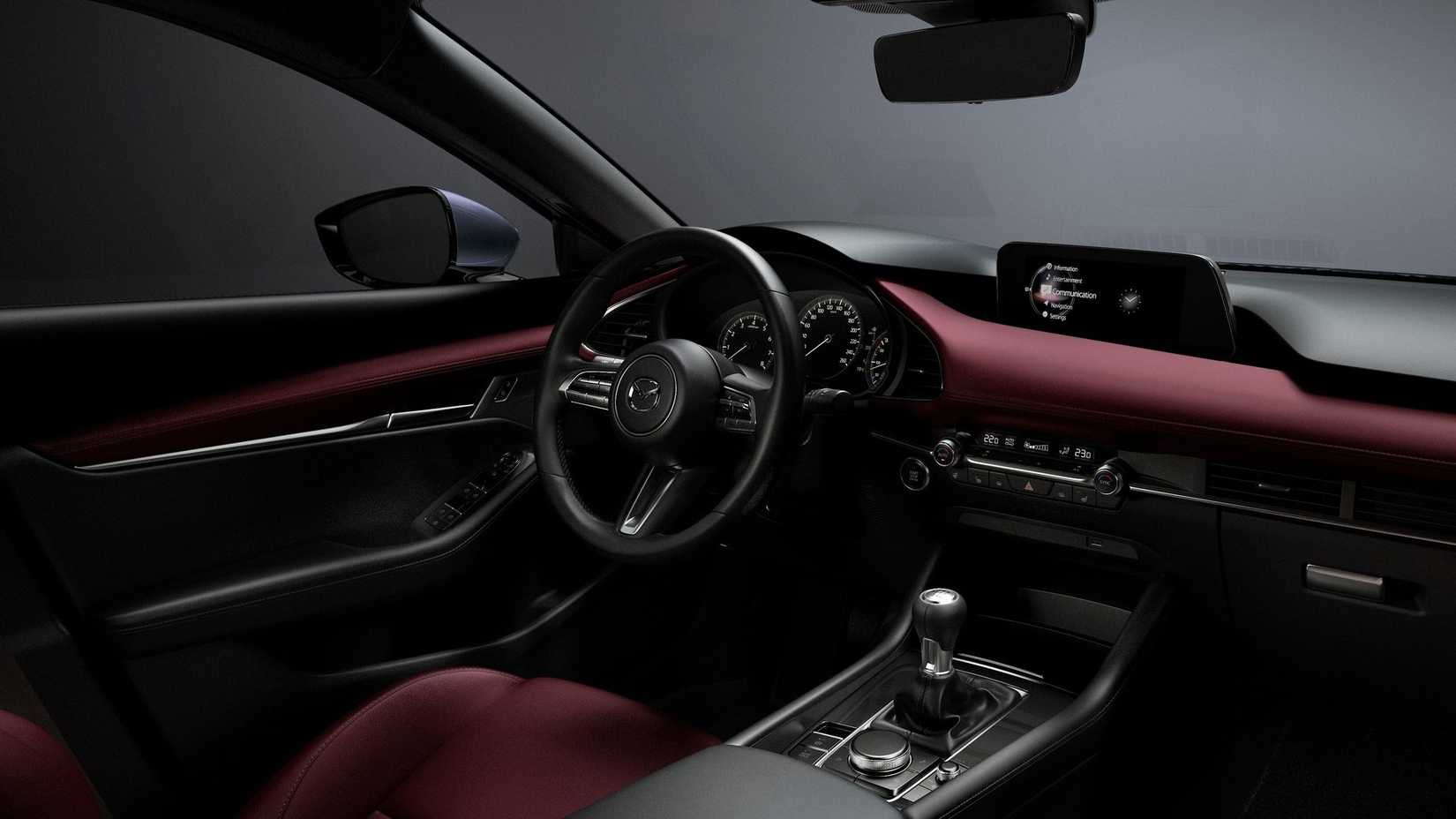 2025 মাজদা 3-এর সামনের আসনগুলির অভ্যন্তরীণ শট 