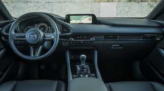 Interior shot of the dashboard in a 2025 Mazda 3