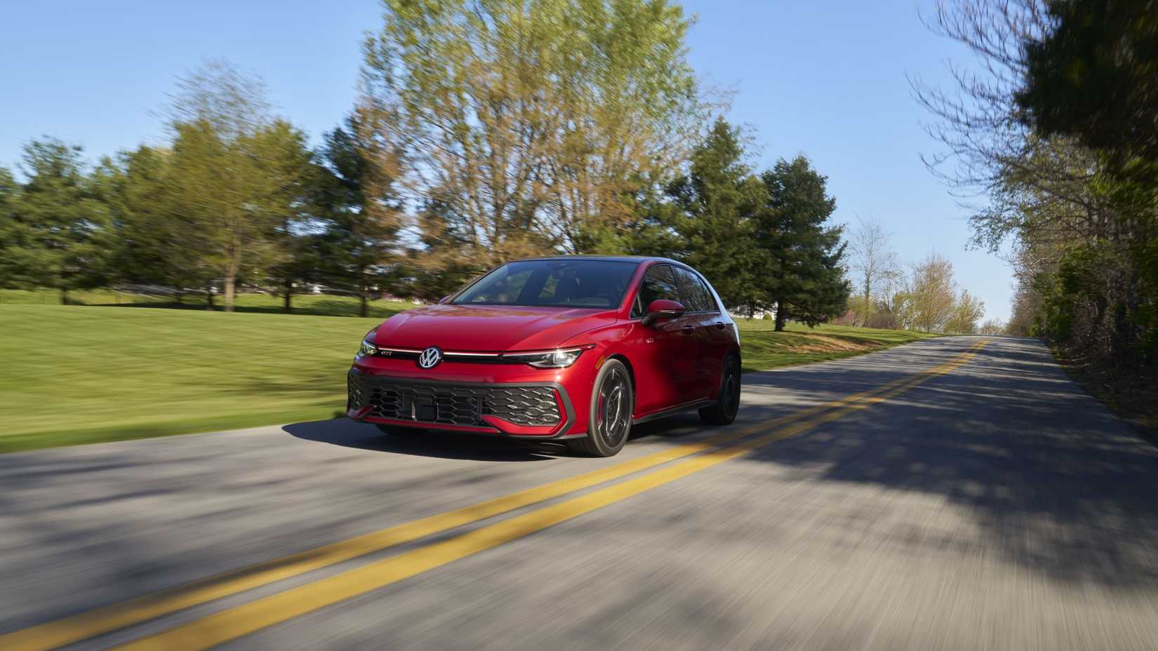 Front 3/4 action shot of a 2025 Volkswagen Golf GTI