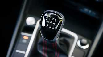 Close up of the manual gear-shifter in a 2025 Volkswagen Jetta GLI