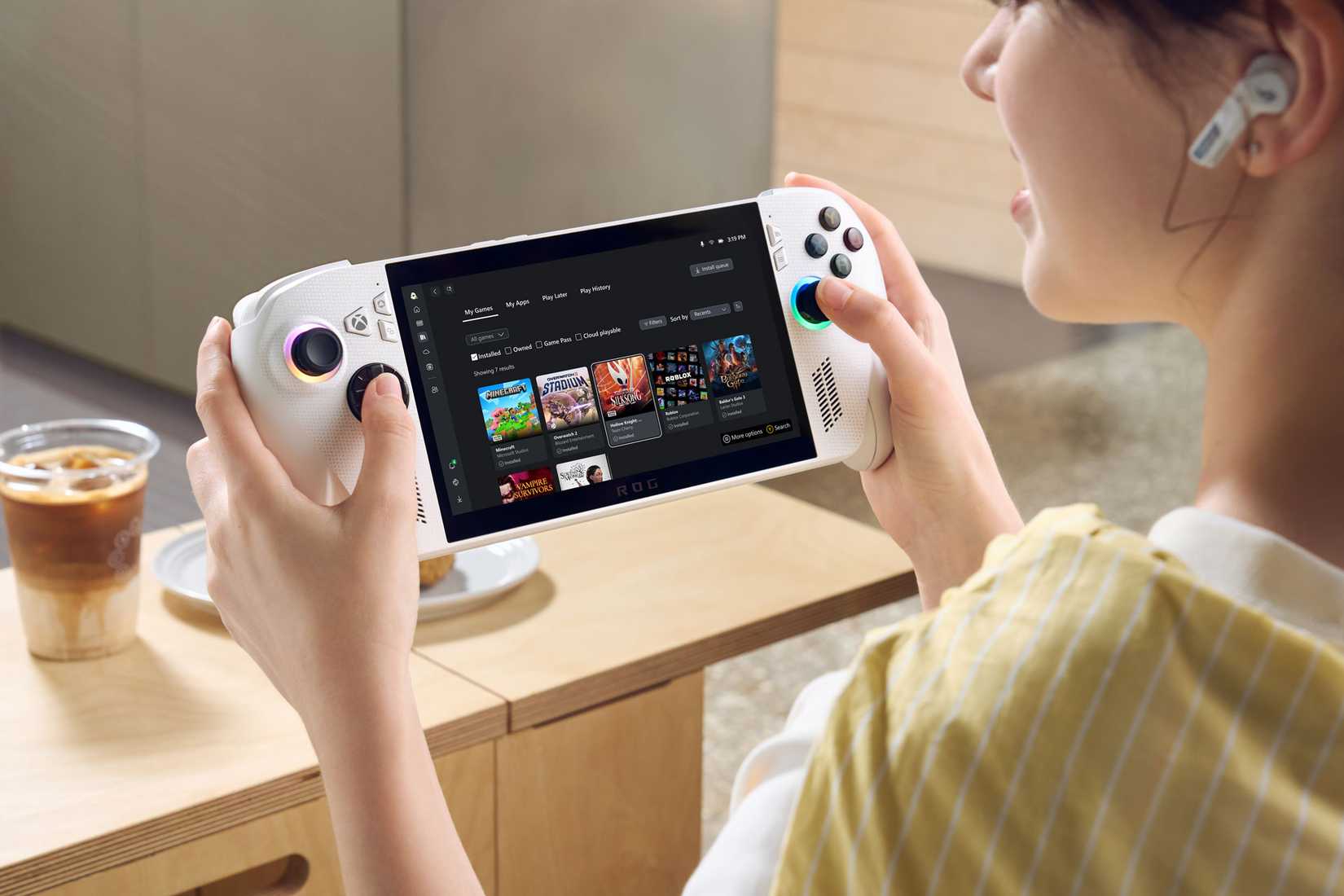 A promotional image showing a person using an Xbox ROG Ally X.
