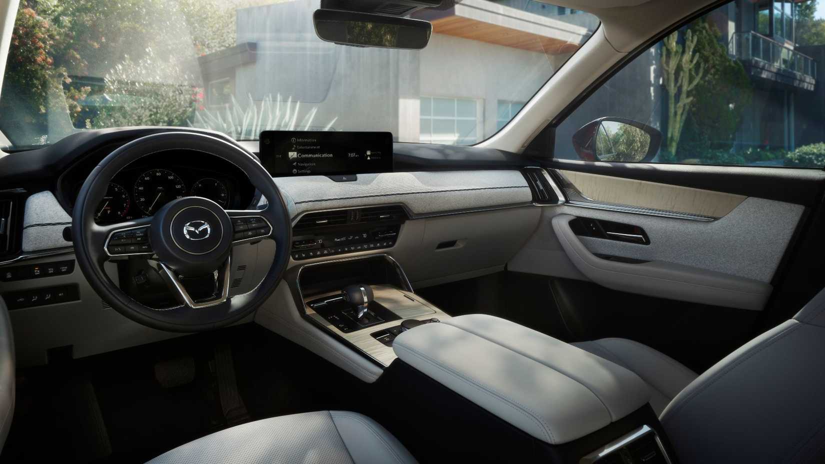 Shot inside the cabin of a 2025 Mazda CX-90 showing the interior.