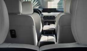 Shot inside the cabin of a 2025 Mazda CX-90 showing the interior.
