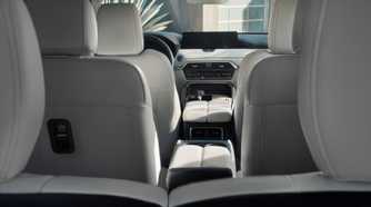 Shot inside the cabin of a 2025 Mazda CX-90 showing the interior.