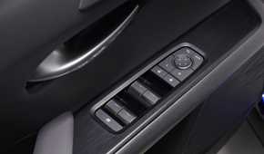 Shot of the window controls in the door of a 2025 Lexus UX