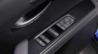 Shot of the window controls in the door of a 2025 Lexus UX