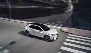 Front 3/4 action shot of a 2025 Lexus UX