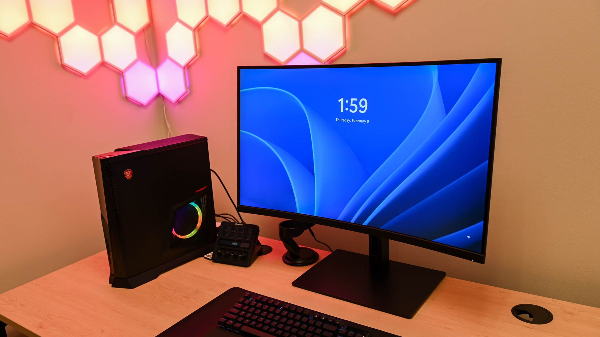 A slightly curved monitor connected to a PC running Windows 11. 