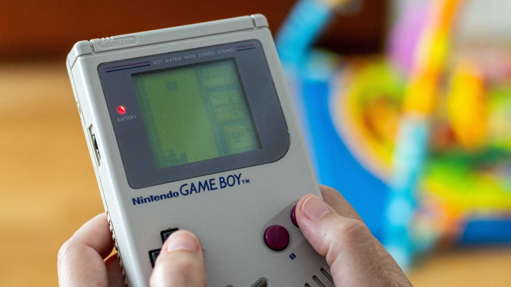 A Game Boy console playing Tetris.