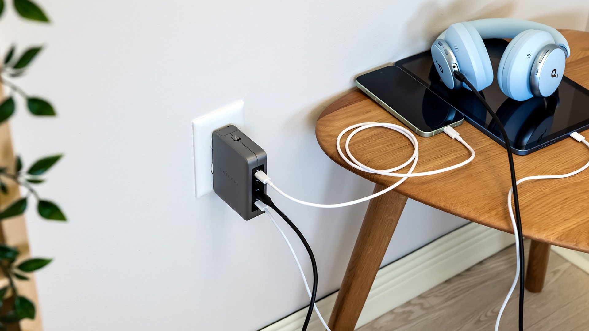 Charging multiple devices with the Satechi 145 USB-C 4-Port GaN Travel Charger.