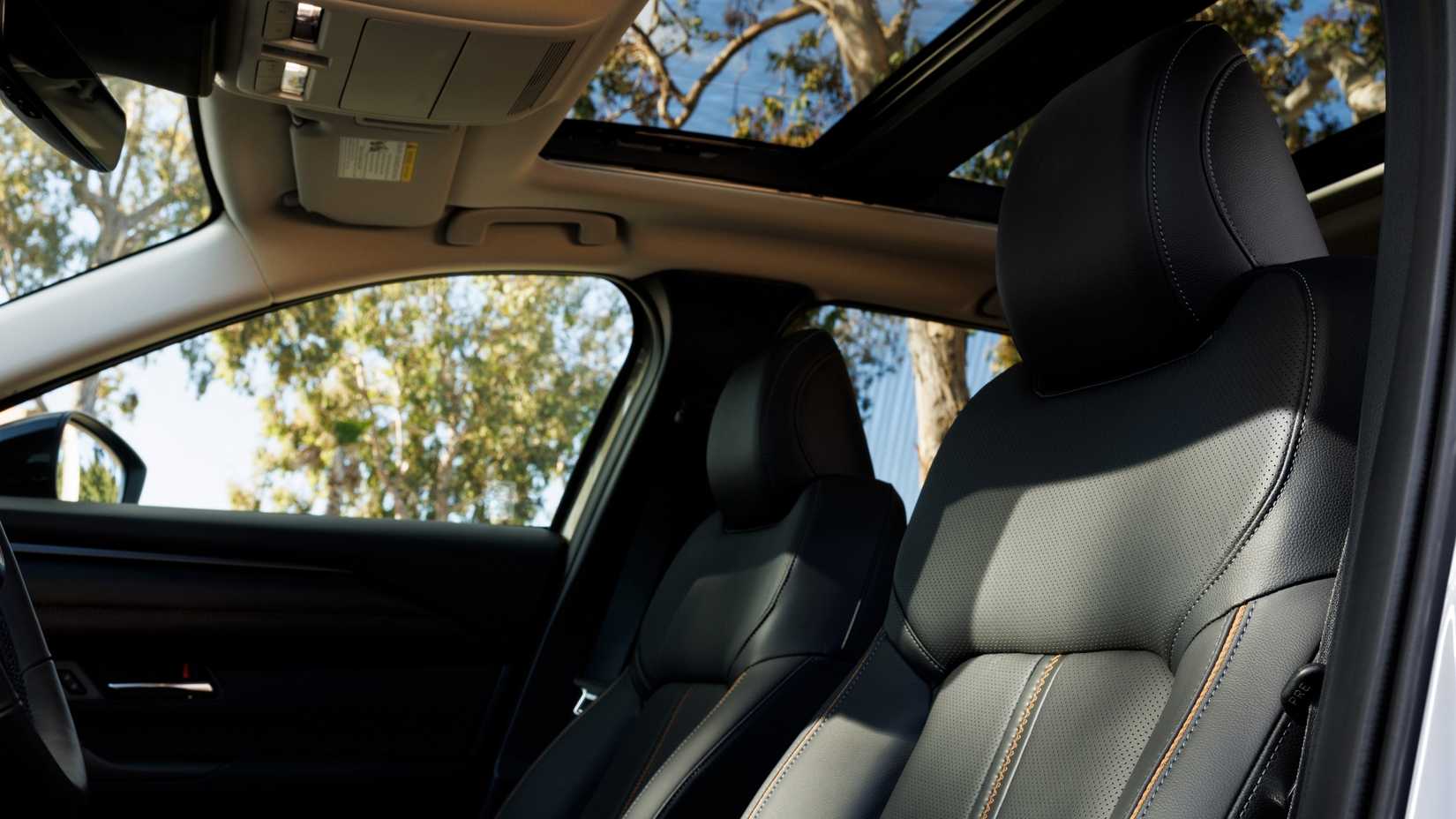 Close up of the front seats in a 2025 Mazda CX-50 Hybrid