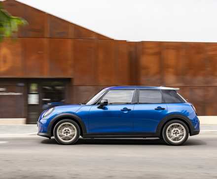 Side profile action shot of a 2026 Mini Cooper