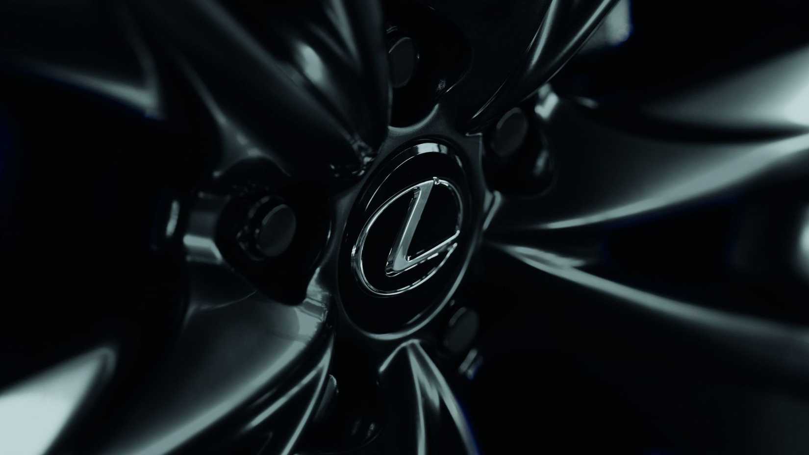 Close-up shot of the black alloy wheel on a 2025 Lexus ES 300h.