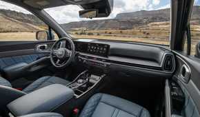 Shot inside the cabin of a 2025 Kia Sorento Hybrid showing the interior.