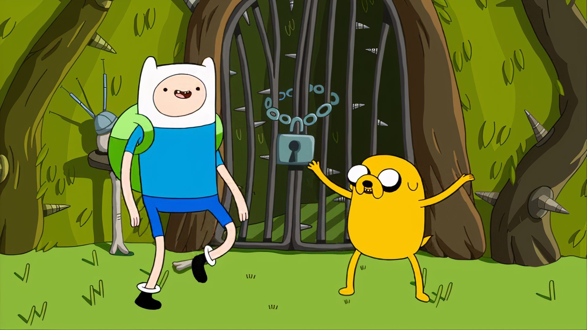 Finn and Jake outside of a locked gate in Adventure Time.