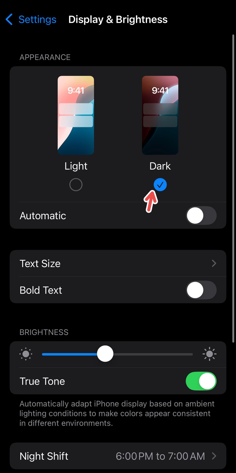 Enabling Dark Mode on iPhone.