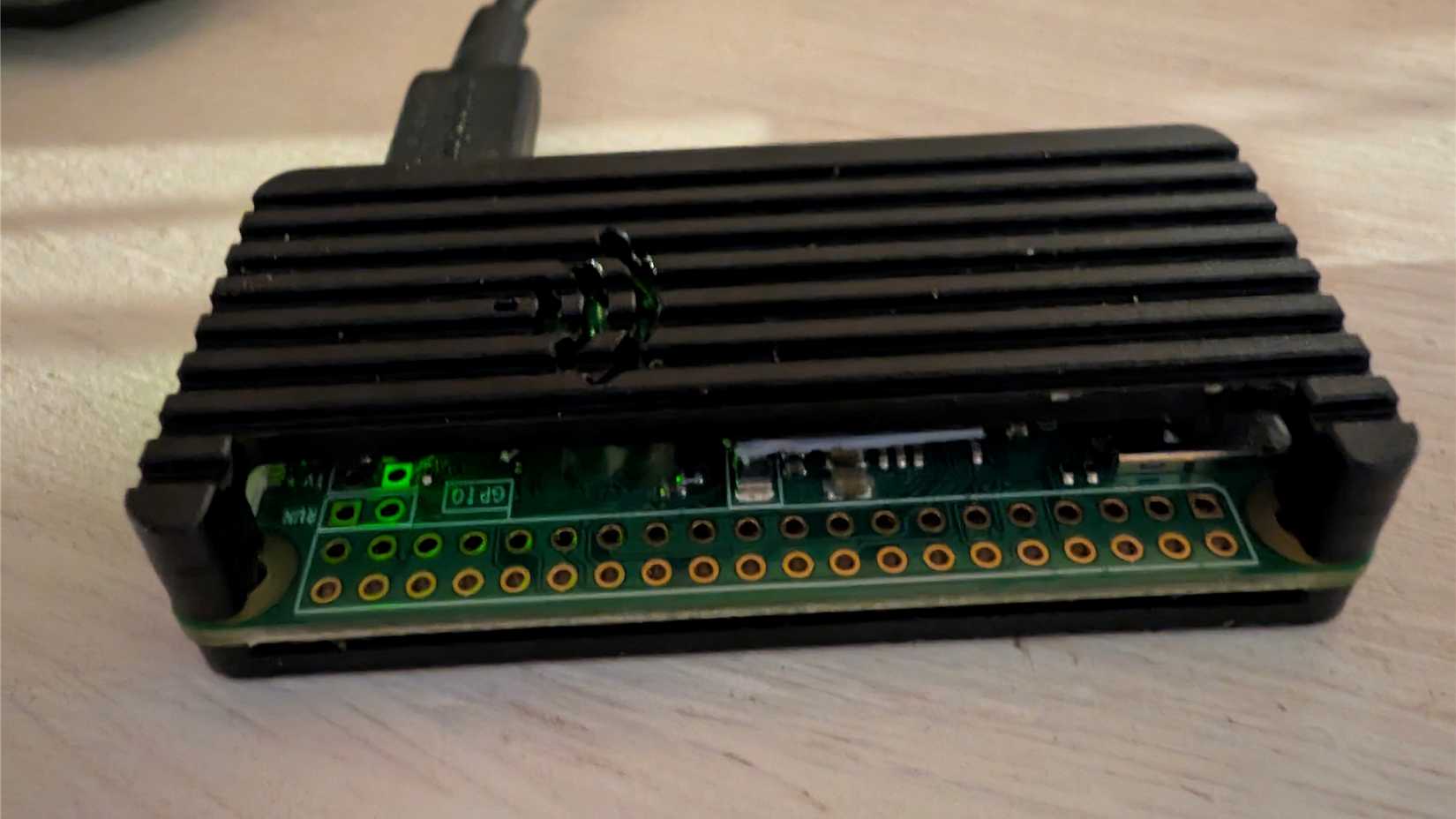 A Raspberry Pi 0W in a small case. 