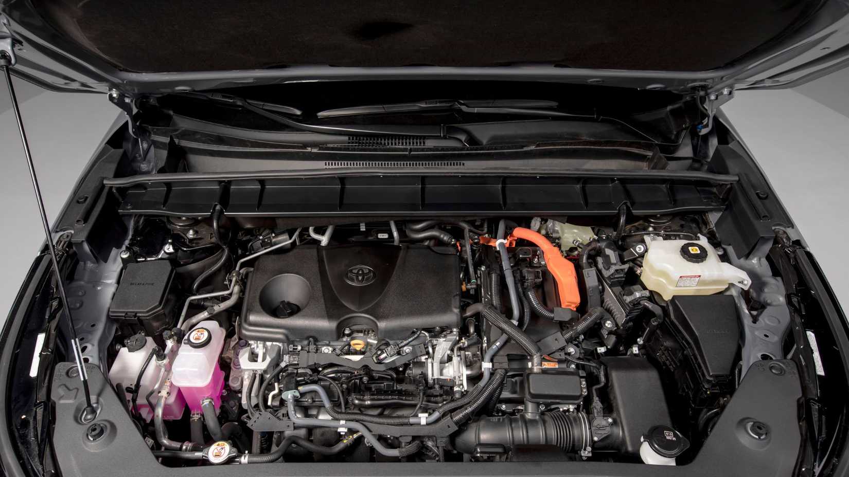 Close-up shot under the hood of a 2025 Toyota Highlander Hybrid.