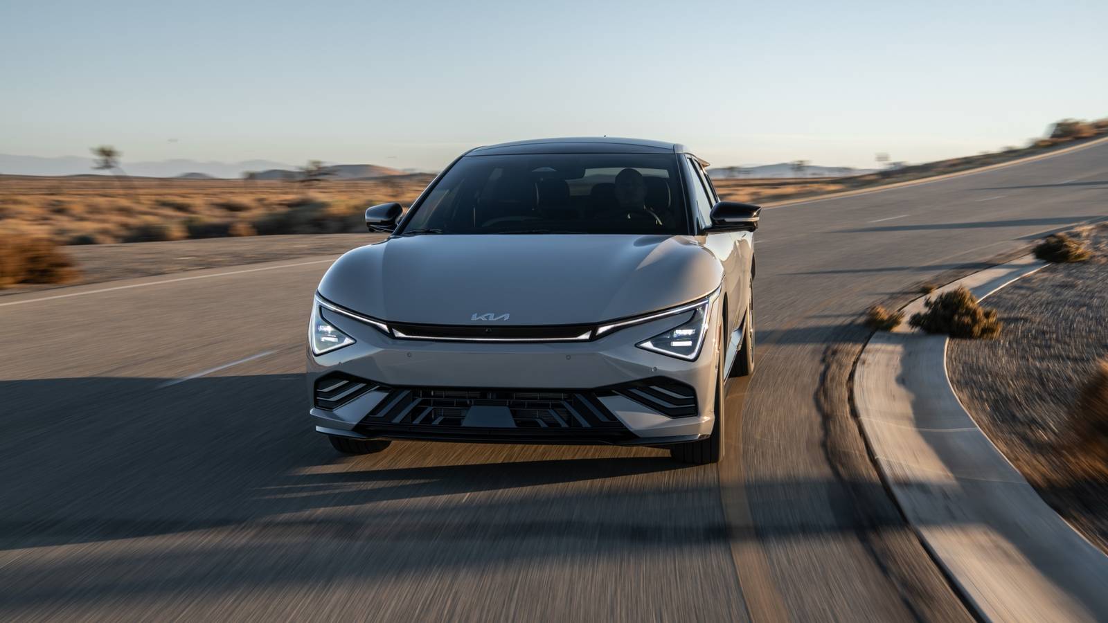 Dyanmic front 3/4 action shot of a 2025 Kia EV6