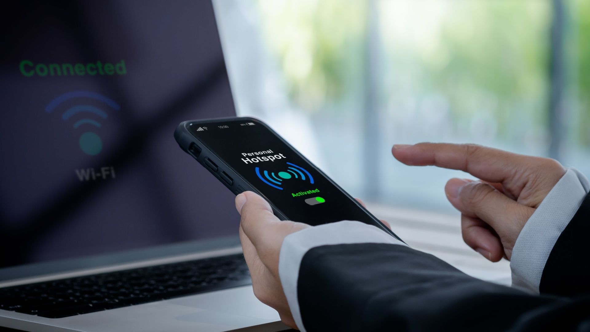 A person activates their personal hotspot.