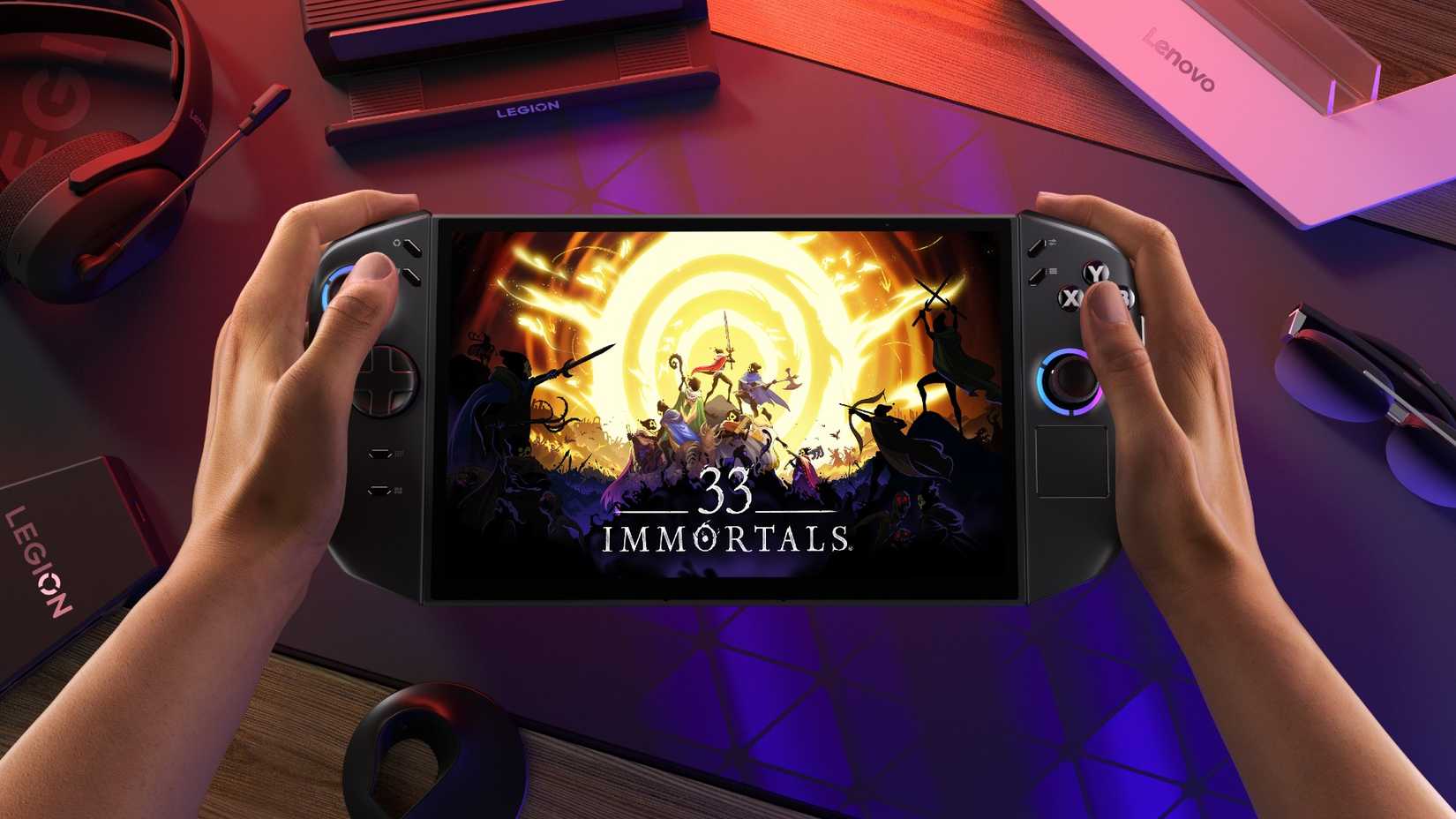 A person holding a Lenovo Legion Go (8.8, 2) while playing 33 immortals