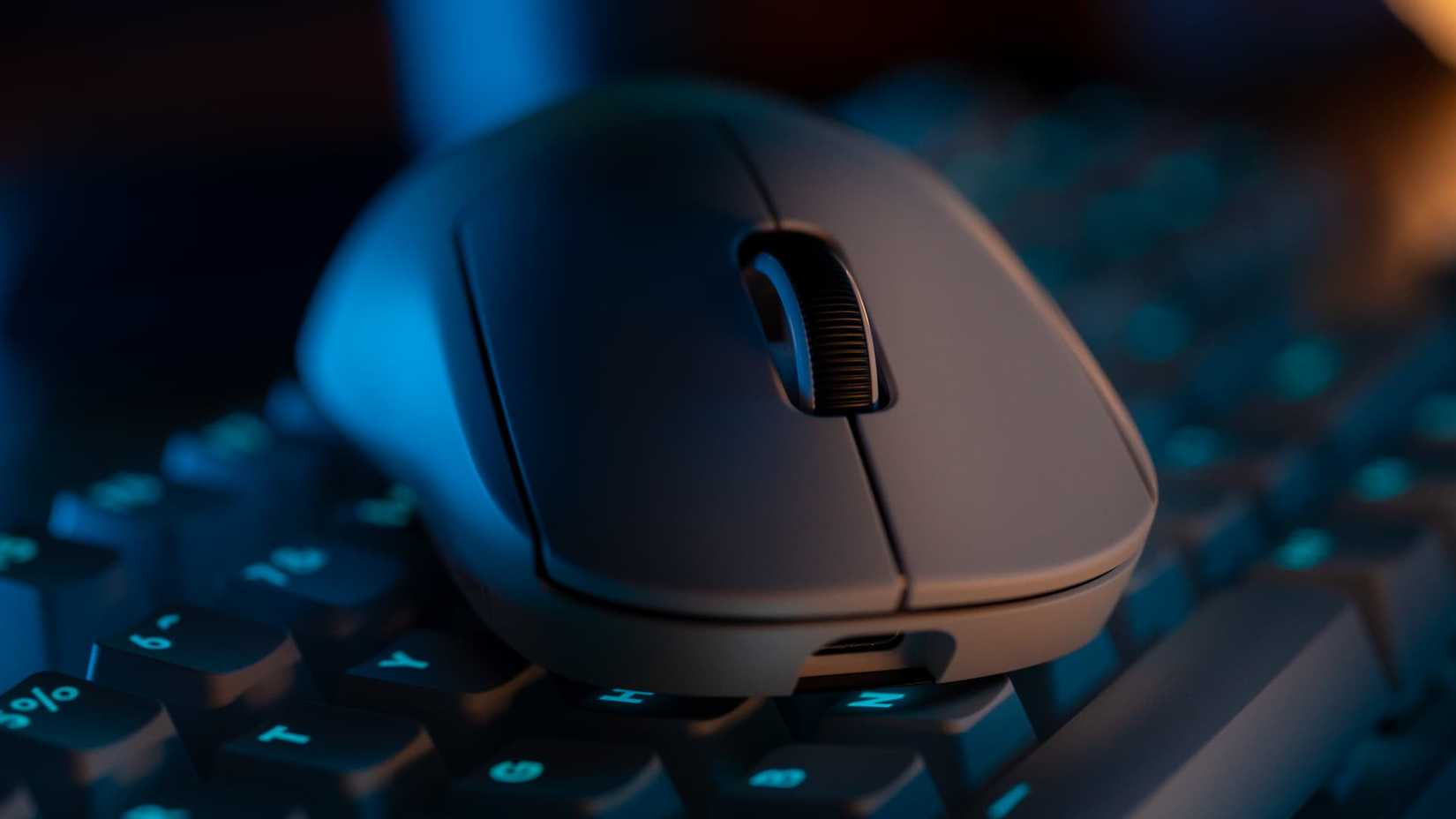 A Pro X Superlight 2c mouse on a keyboard.
