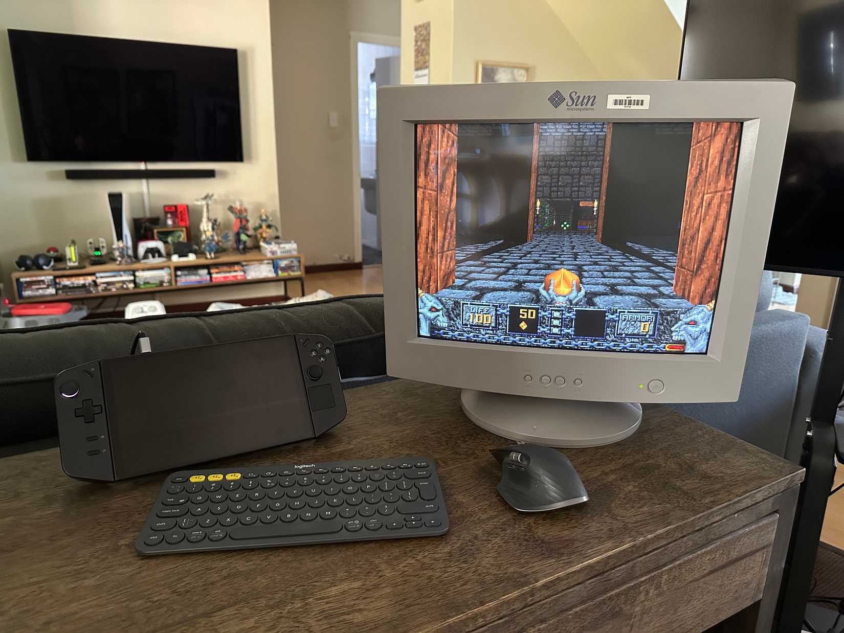 A SUN Microsystems CRT monitor connected to a Legion GO handheld PC.