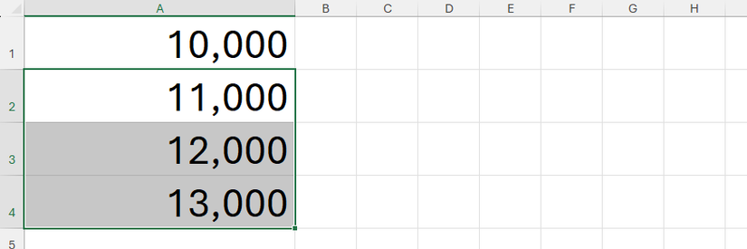 Quatro células no Excel contendo valores com os milhares de separadores.