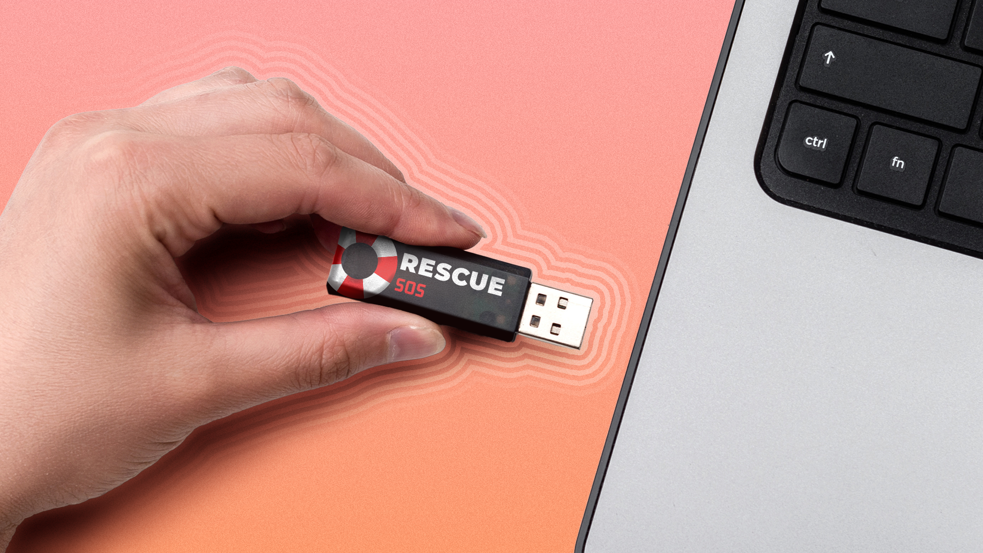Hand inserting a USB flash drive labeled 'Rescue SOS' into a laptop.