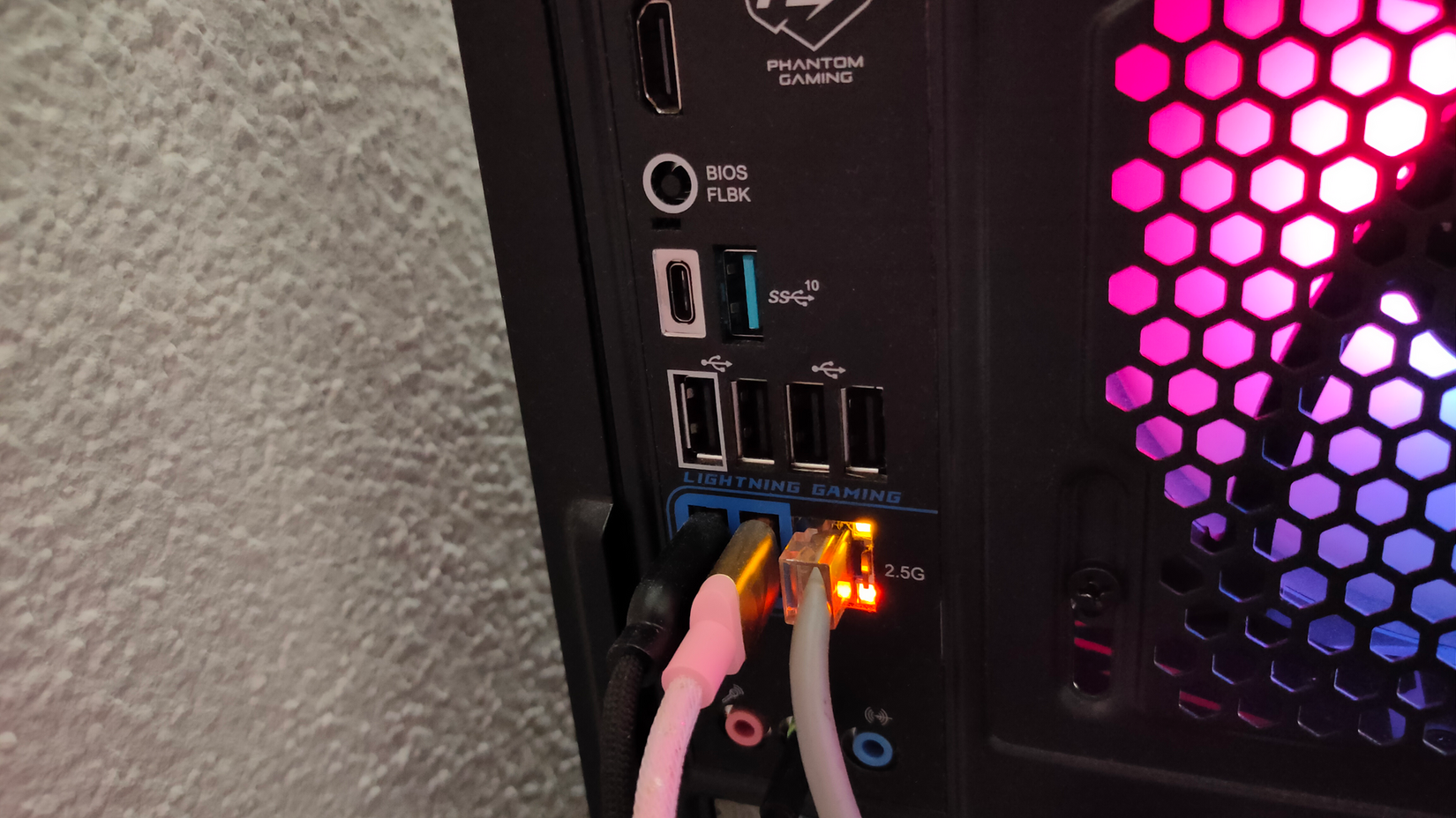 The I/O USB ports on an AsRock Phantom Gaming motherboard.