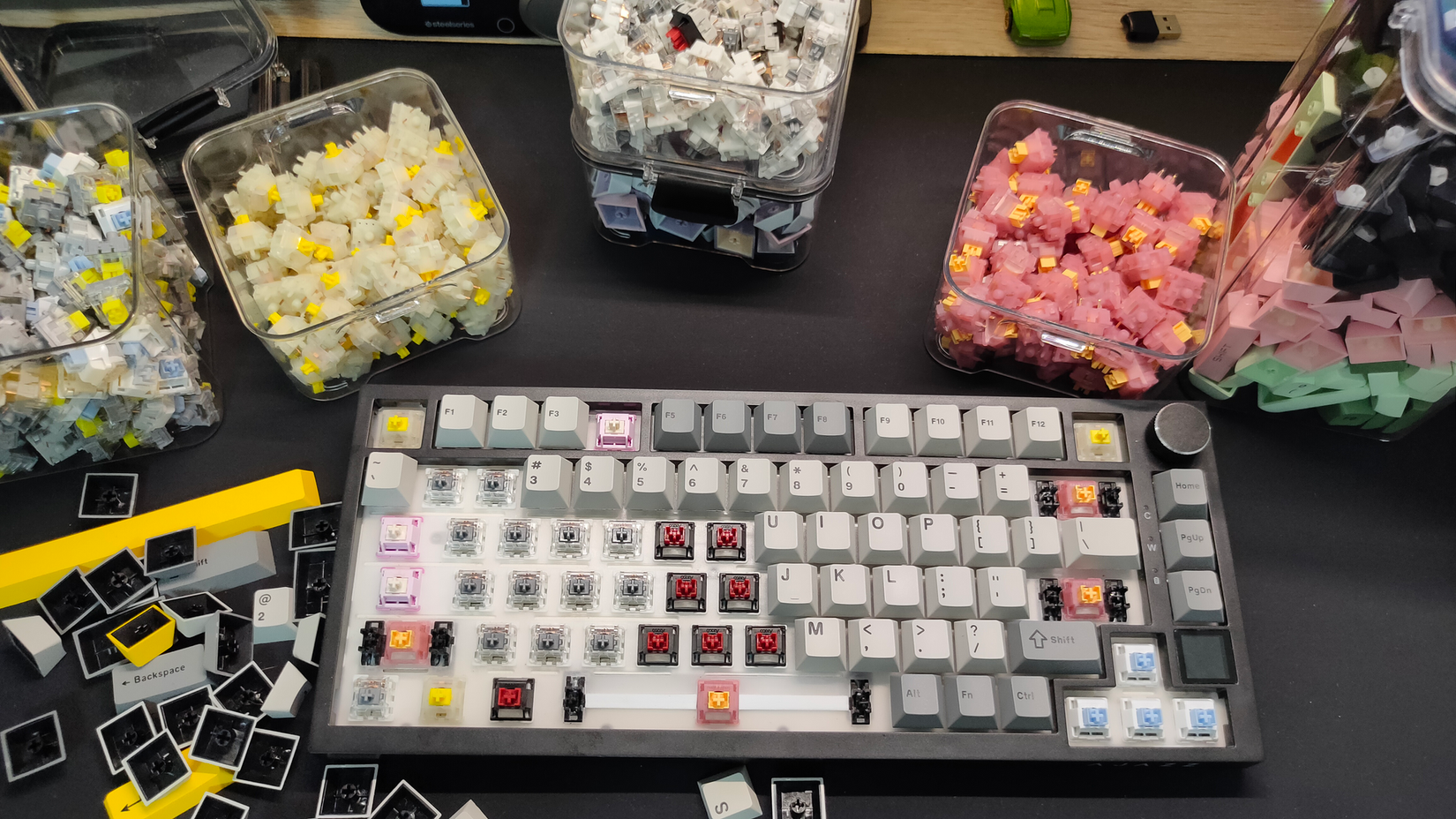 The Ajazz AK820 Pro mechanical keyboard featuring a mix of keycaps and switches.