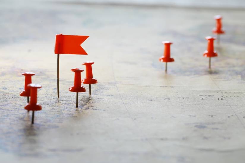 Red pins in a map.