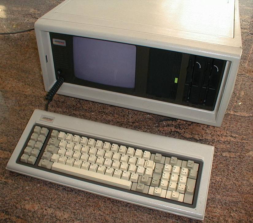 The Compaq Portable on a marble surface.