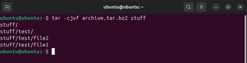 The Linux tar command being used to create an archive with bzip2 compression.
