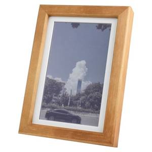 The Waveshare 7.3-inch color E-Ink display comes mounted in a wood frame with built-in battery