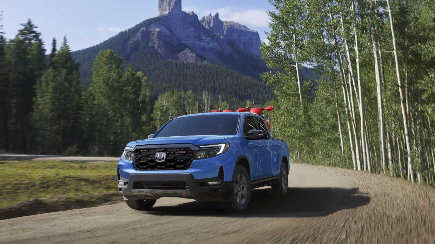 Front 3/4 action shot of a 2024 Honda Ridgeline TrailSport