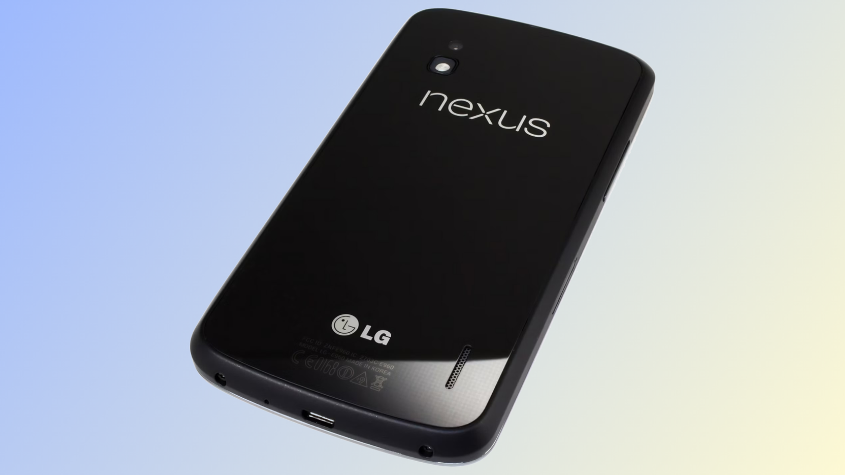 The LG Nexus 4 against a blue and yellow background.
