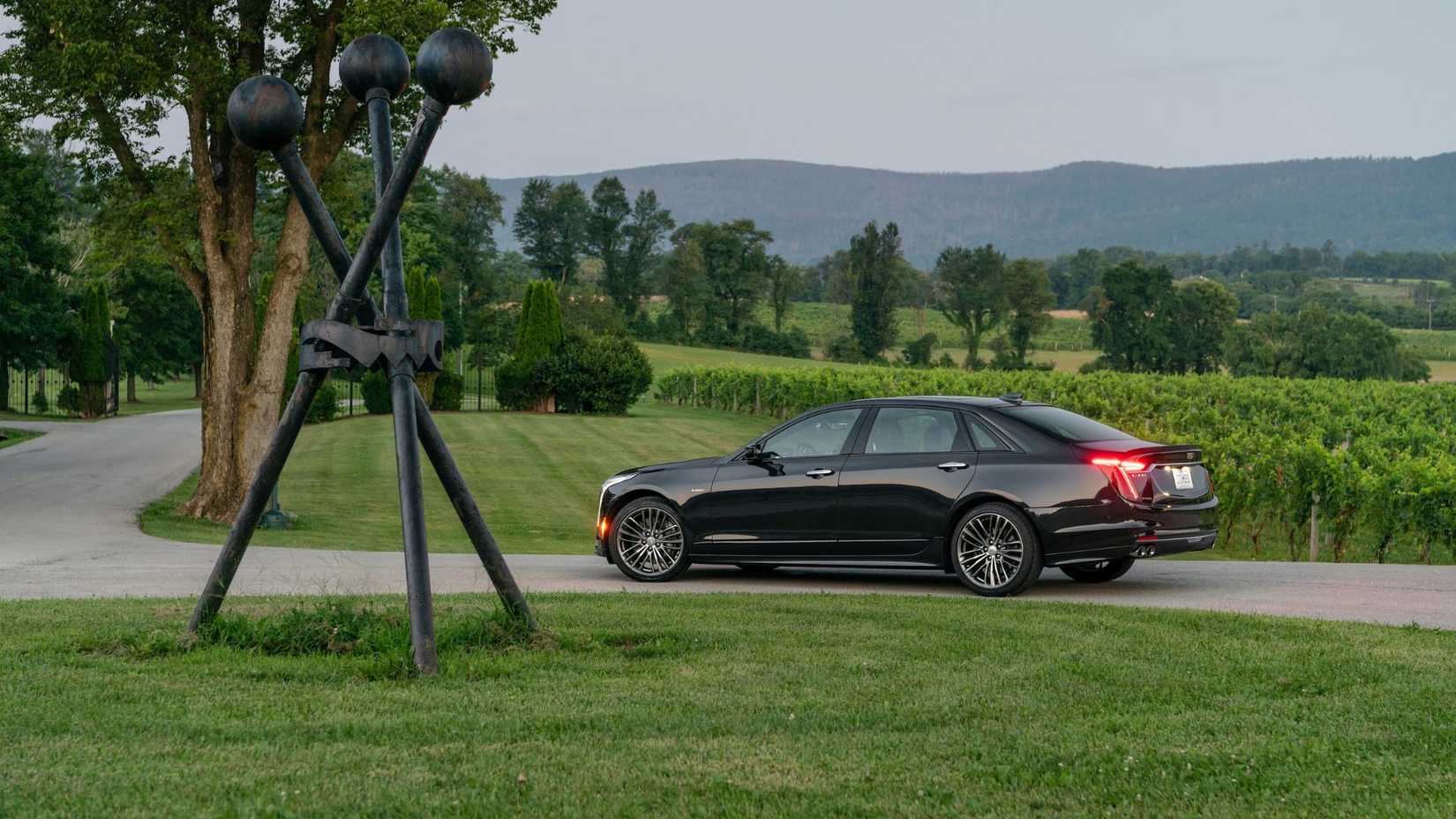 Static rear 3/4 shot of a black 2020 Cadillac CT6-V.