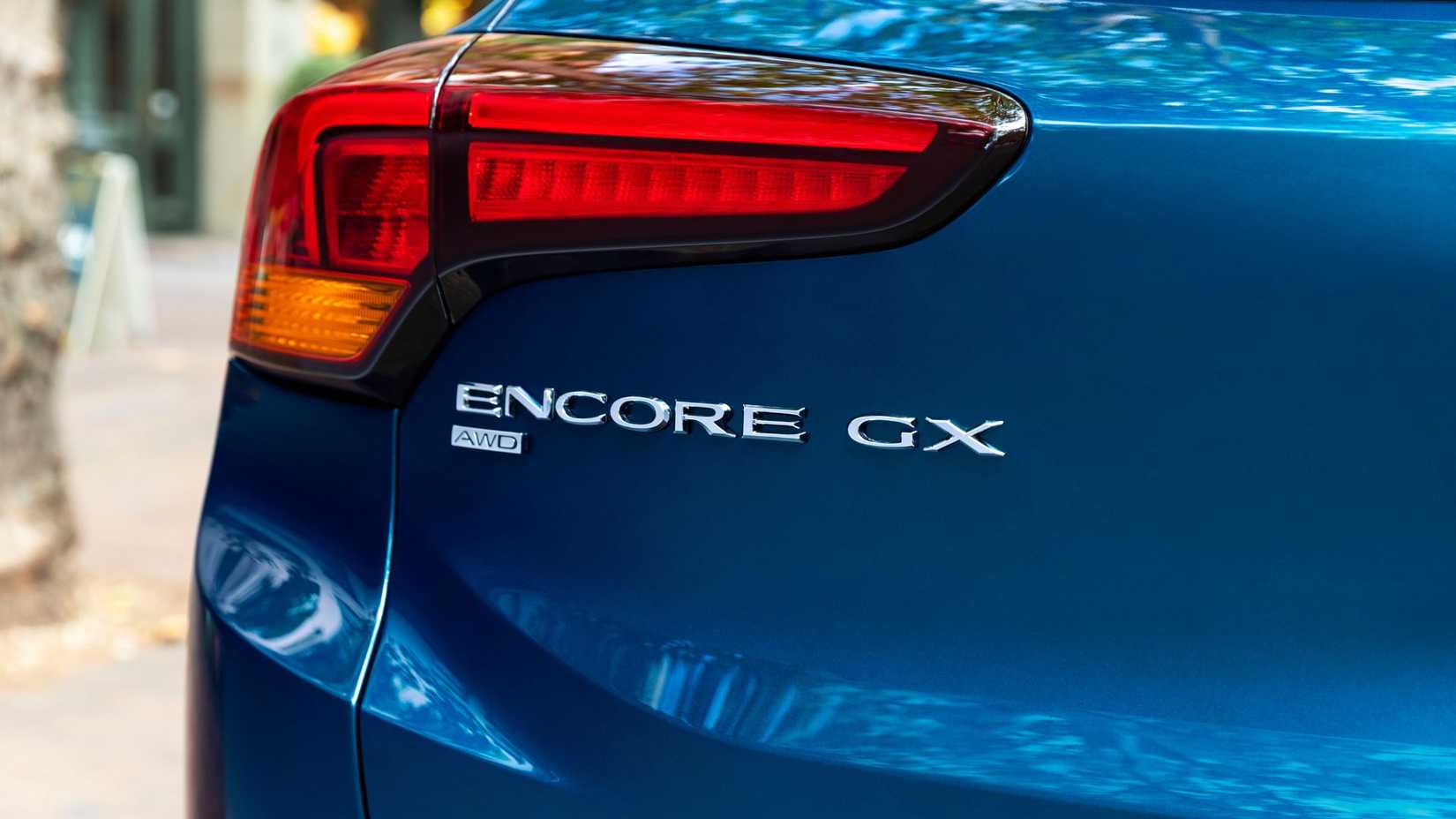 Close-up shot of the badging on the rear tailgate of a blue 2022 Buick Encore GX.
