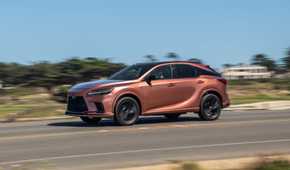 Dynamic front 3/4 shot of a copper 2026 Lexus RX 500h F SPORT.
