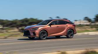 Dynamic front 3/4 shot of a copper 2026 Lexus RX 500h F SPORT.