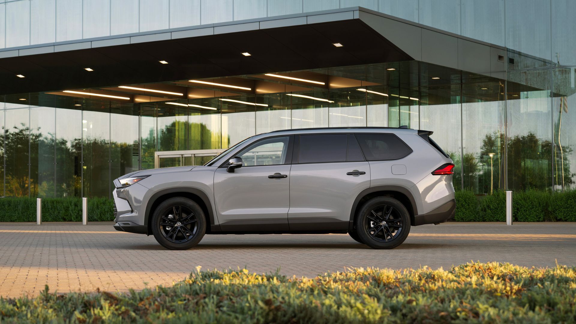 Static side profile shot of a gray 2026 Toyota Grand Highlander.