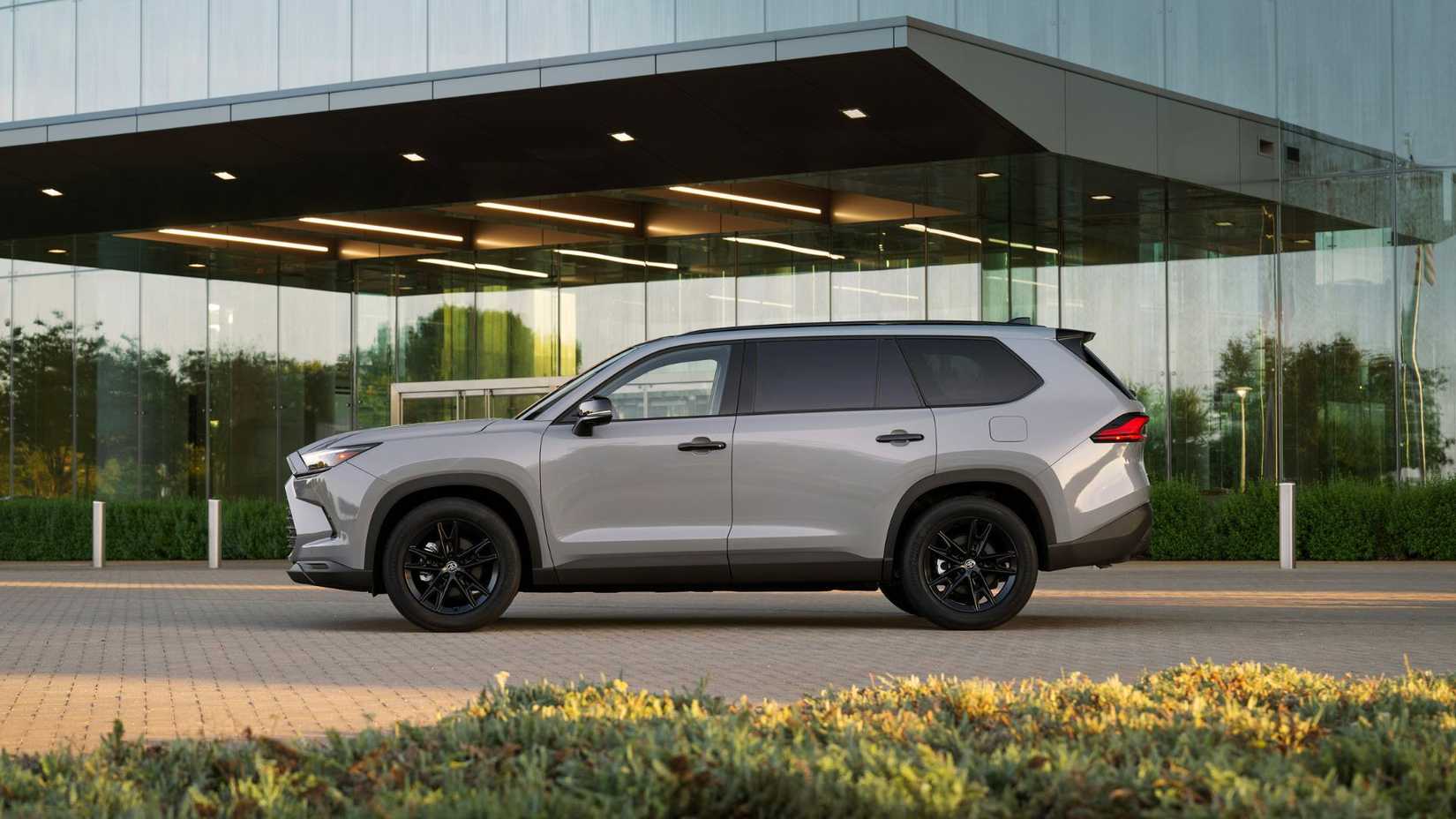 Static side profile photo of a gray 2026 Toyota Grand Highlander.