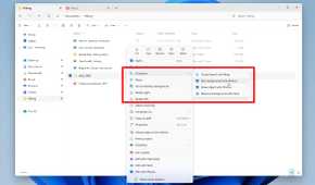 A person looking through the ai part of photos to make adjustments
