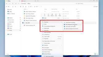 A person looking through the ai part of photos to make adjustments