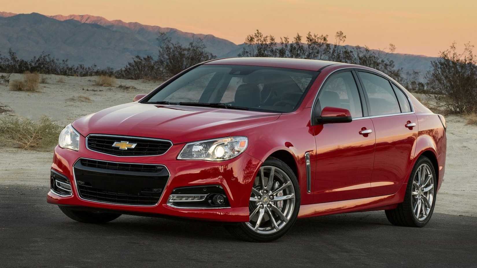 Static front 3/4 shot of a red 2014 Chevrolet SS.